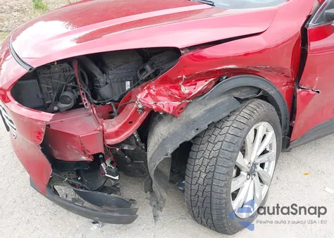 2021 Ford Escape Titanium z USA, uszkodzony, nr VIN 1FMCU9J90MUA33755